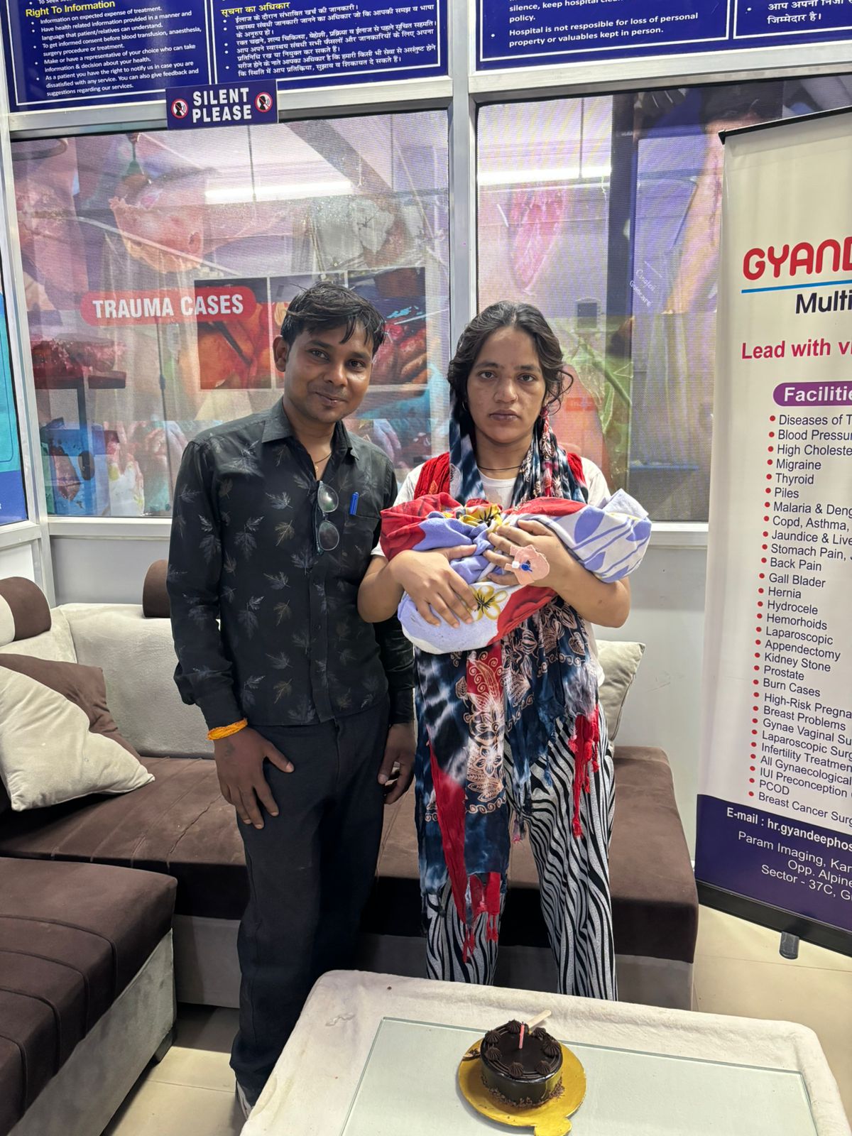 Parents with newborn baby after successful delivery
