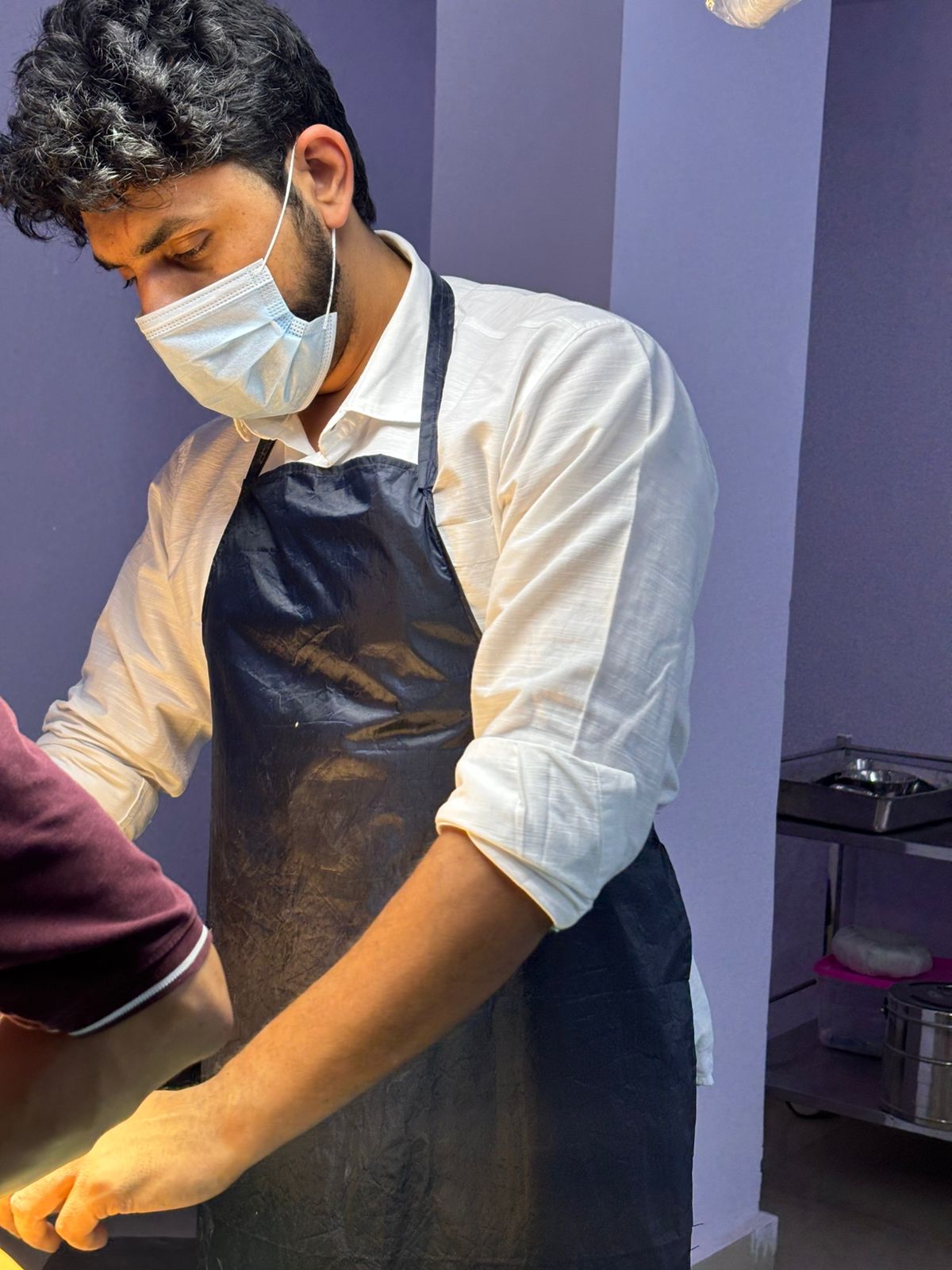 Doctor performing medical procedure