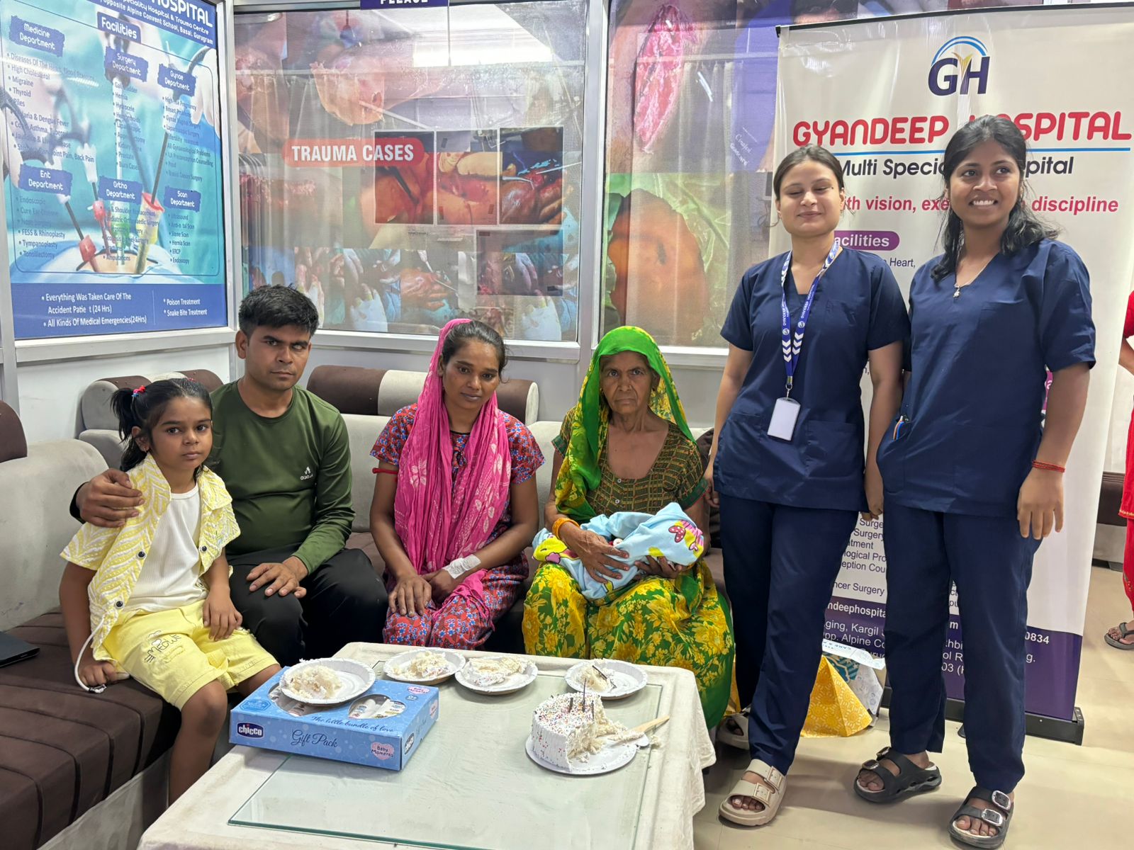 Happy family with newborn baby at Gyandeep Hospital